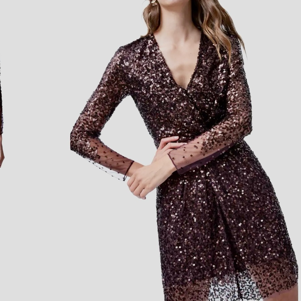 Beautiful beaded eggplant cocktail dress. Has some stretch. Sheer beaded overlay